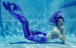 A mermaid posing underwater